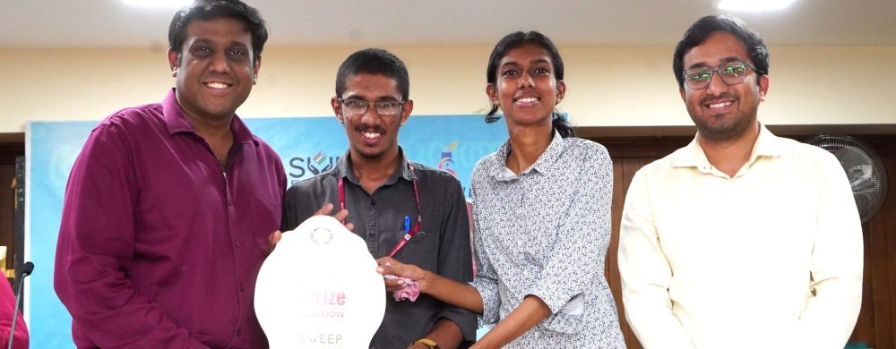 Ms. Anna Dominic and Mr. Anugrah V. K. of Department of History receiving the First Prize from the Ernakulam District Collector Mr. N S K Umesh IAS for the Quiz Competition held by Systematic Voters’ Education and Electoral Participation